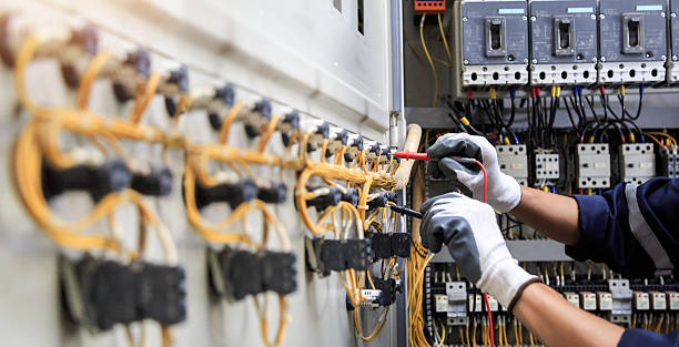 Professional Electrician technician working in Wabasso Beach, FL